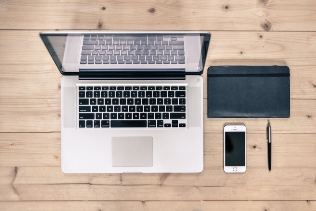 An image of a computer and a mobile device, either of which can be used to send a fax without a phone line.