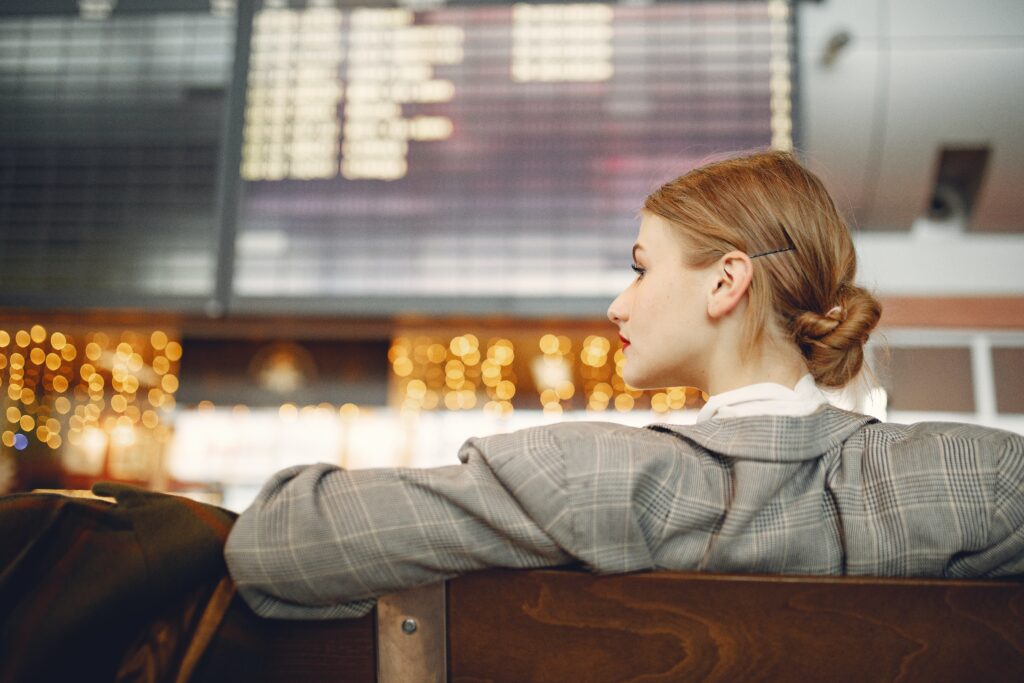 An image of a woman sending a fax internationally.